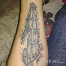 Tattoo Guitar neck on the forearm motif: other
