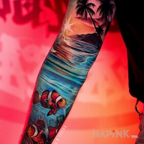 Tattoo Oceanic sleeve with fish and palm trees on the forearm motif: floral style: realistic