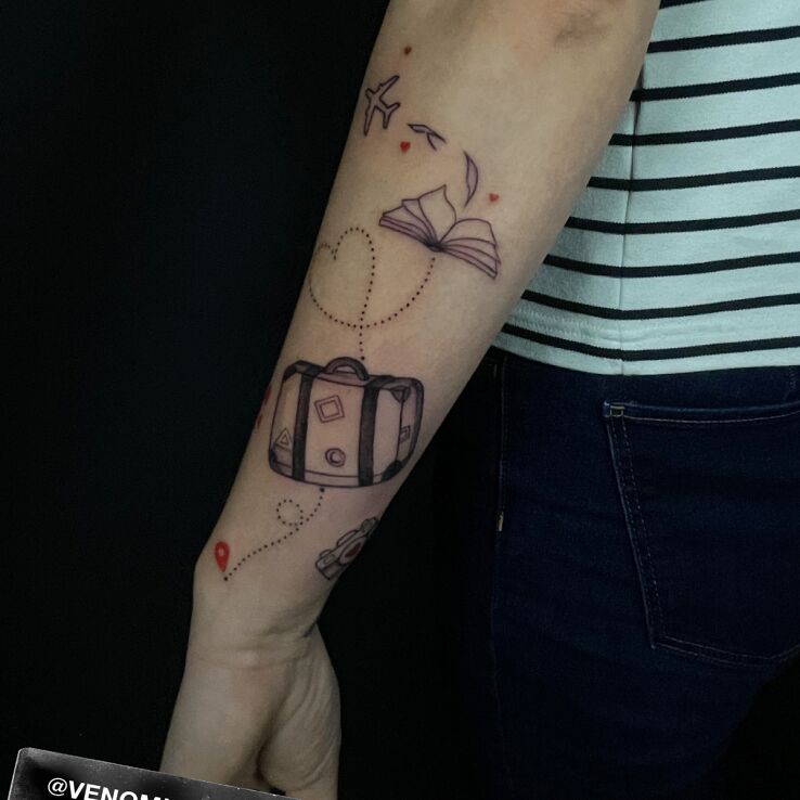 Tattoo Travel motif with luggage in objects motif and graphic / illustrative style on the forearm