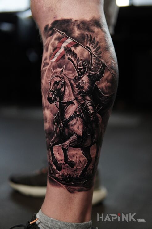 Tattoo Defeating the Austrians in animals motif and realistic style on the calf