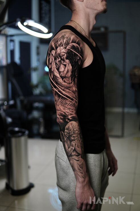 Tattoo Angel in characters motif and realistic style On the arm