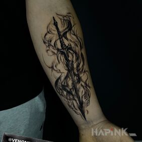 Tattoo Sword in the Clouds of Smoke on the forearm motif: black and gray style: graphic / illustrative