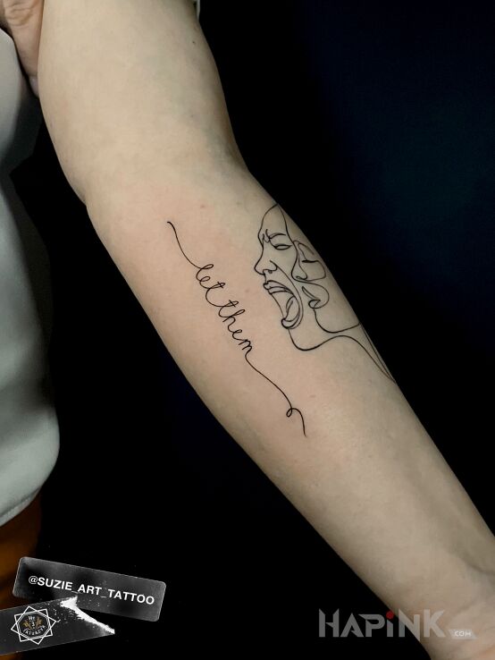 Tattoo Let them in lettering motif and calligraphy style On the arm