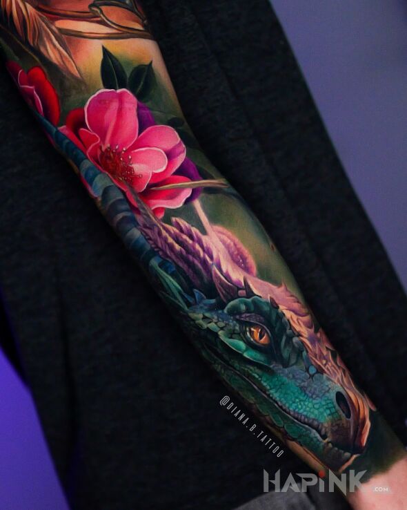 Tattoo Realistic magic dragon in colorful motif and realistic style on the forearm