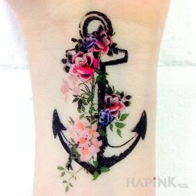 Tattoo Charming anchor on the wrist motif: colorful
