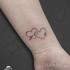 Tattoo Small Hearts with Initials (Fine Line) On the arm style: minimalistic