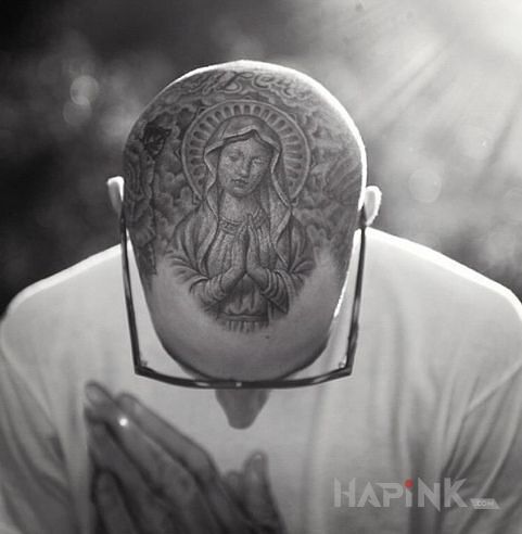 Tattoo Our Lady in black and gray motif and dotwork style on the head
