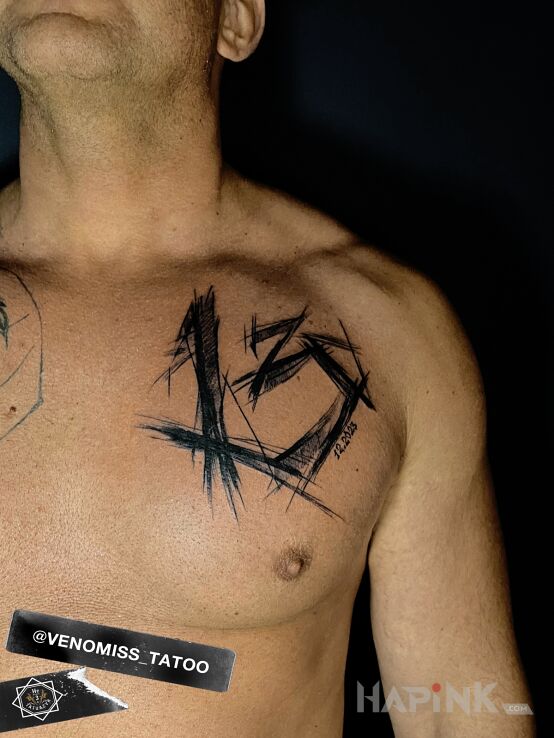 Tattoo 13 - thirteen in lettering motif and sketch style on the chest