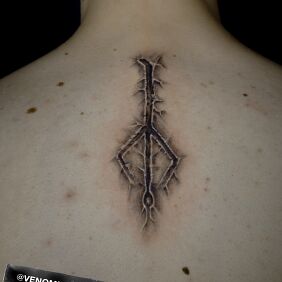 Tattoo Rune on the back motif: ripped skin style: graphic / illustrative