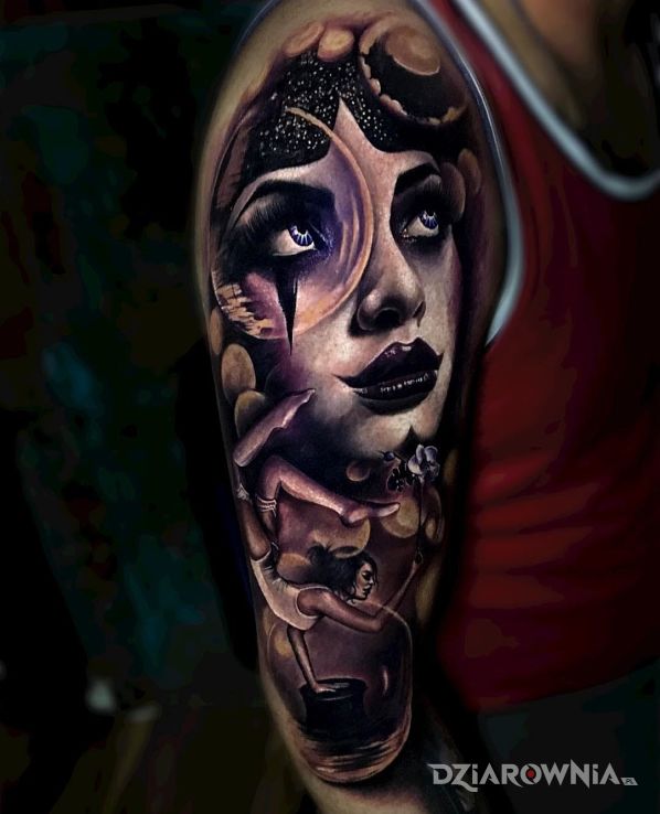 Tatuaż w cyrku w motywie 3D na ramieniu