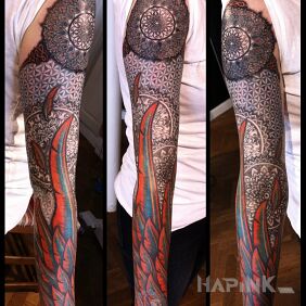 Tattoo Feathers in the sleeve on the forearm motif: mandalas