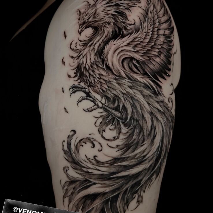 Tattoo Phoenix in animals motif and graphic / illustrative style on the shoulder