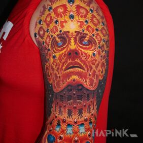 Tattoo Oversoul Alexa Greya on the upper arm motif: religious style: surrealistic