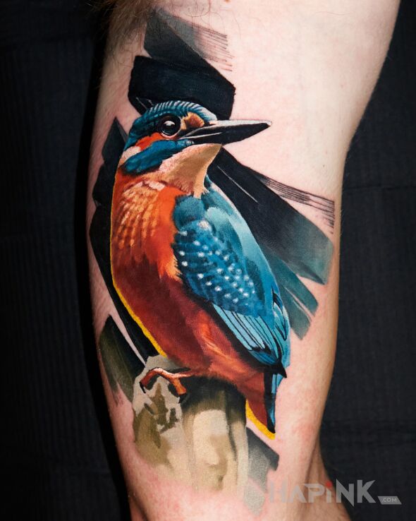 Tattoo Azure Kingfisher in nature motif and realistic style On the arm