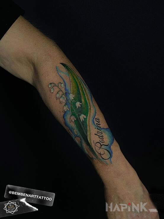 Tattoo Bluebell flowers in colorful motif and graphic / illustrative style on the forearm