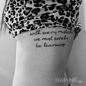 Tattoo Caption on the ribs motif: lettering
