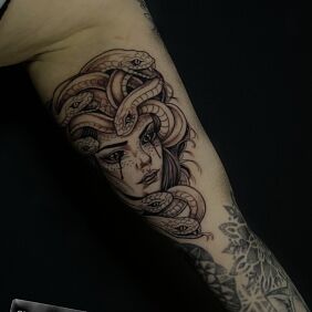 Tattoo Meduza On the arm motif: characters style: graphic / illustrative