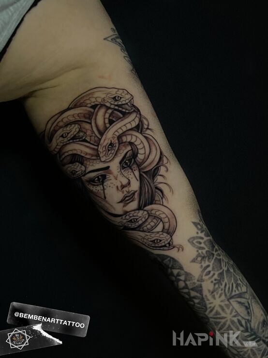 Tattoo Medusa in characters motif and graphic / illustrative style On the arm