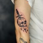 Dagger Piercing a Skull