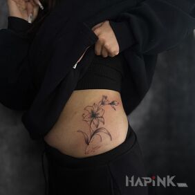 Tattoo Kwiaty na żebrach on the ribs motif: flowers style: graphic / illustrative
