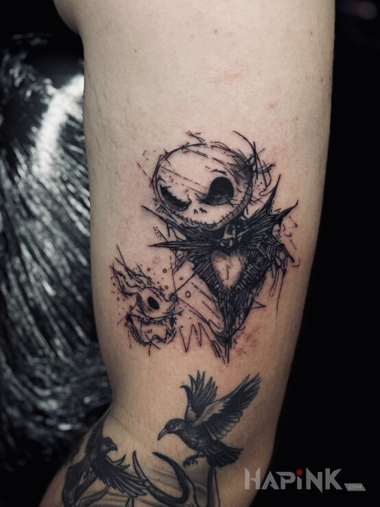 Tattoo Jack Skellington & Zero in characters motif and sketch style on the upper arm