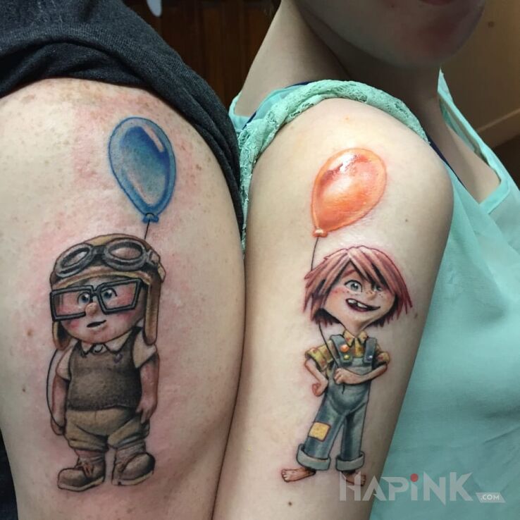 Tattoo Odlot in Love motif on the upper arm