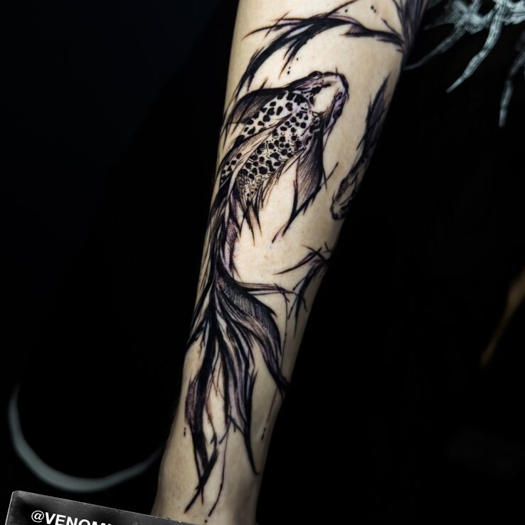 Tattoo Rybki koi in animals motif and sketch style On the arm
