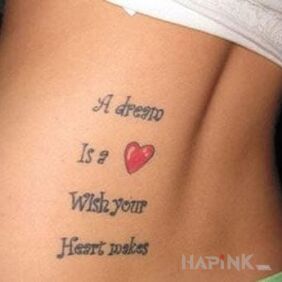 Tattoo Something about the heart on the back motif: lettering