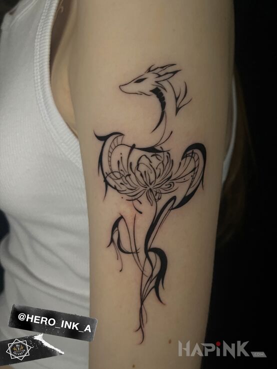 Tattoo Dragon with a flower in flowers motif and abstract style On the arm