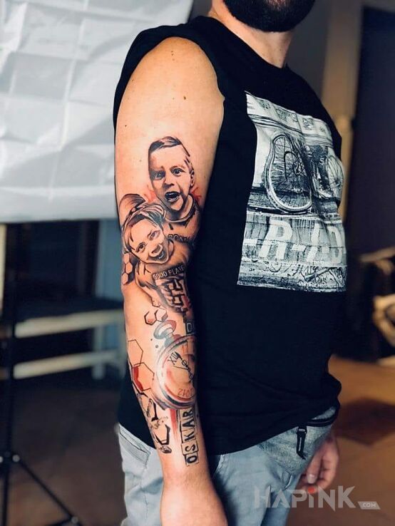 Tattoo Taki mój..... in sleeves motif on the upper arm