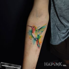 Tattoo Hummingbird On the arm motif: colorful style: Watercolor