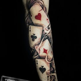 Tattoo Kareta On the arm motif: casino style: realistic