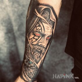 Tattoo Viking with a raven on the forearm motif: black and gray style: Celtic / Nordic