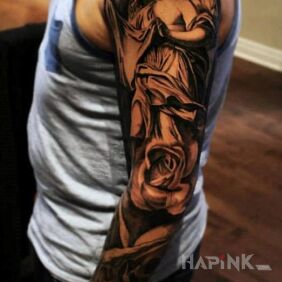 Tattoo Rose under the angel on the forearm motif: sleeves