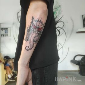 Tattoo Dark Gengar on the forearm motif: black and gray style: graphic / illustrative