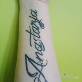 Tattoo Daughter's name on the forearm motif: lettering