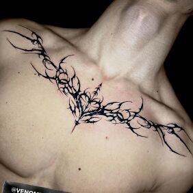 Tattoo Neotribal with a heart in the center on the chest motif: ornaments