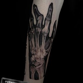 Tattoo Skeleton on the forearm motif: dark style: realistic