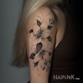 Tattoo Delicate and Light Flowers on a Woman's Hand on the upper arm motif: black and gray style: dotwork