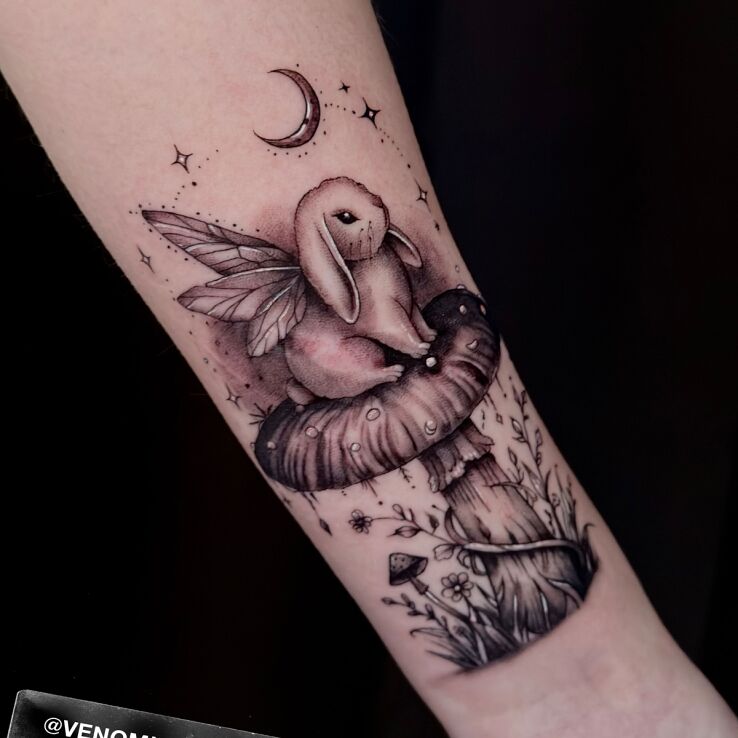 Tattoo Rabbit on a mushroom in animals motif and graphic / illustrative style On the arm