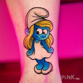 Tattoo Smurfette in color on the leg motif: characters style: graphic / illustrative