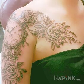 Tattoo Rose on the upper arm motif: flowers
