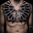 Gotycka rozeta z twarzą — realizm black & grey