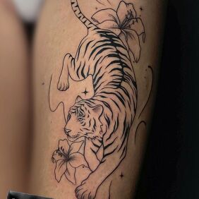 Tatuaż Tygrys na nodze motyw: zwierzęta styl: kontury / linework