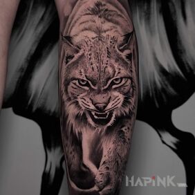 Tattoo Lynx – Black & Grey on the calf motif: black and gray style: realistic