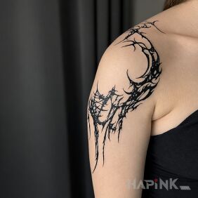 Tattoo Sketchy glitch on the arm on the upper arm motif: black and gray style: blackwork / blackout