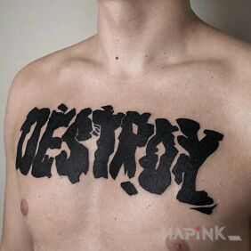 Tattoo Typographic slogan 'Destroy' on the chest motif: lettering style: blackwork / blackout