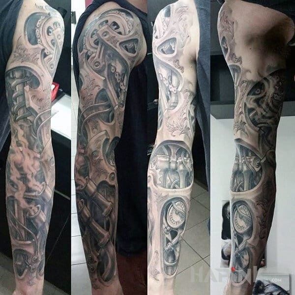 Tattoo Biomechanika in sleeves motif and biomechanics style on the forearm