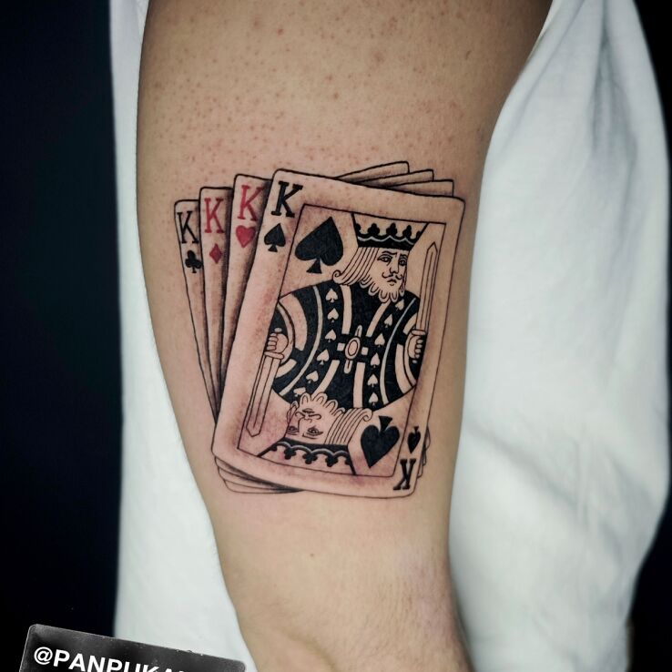 Tattoo Karty z królami in black and gray motif and realistic style On the arm