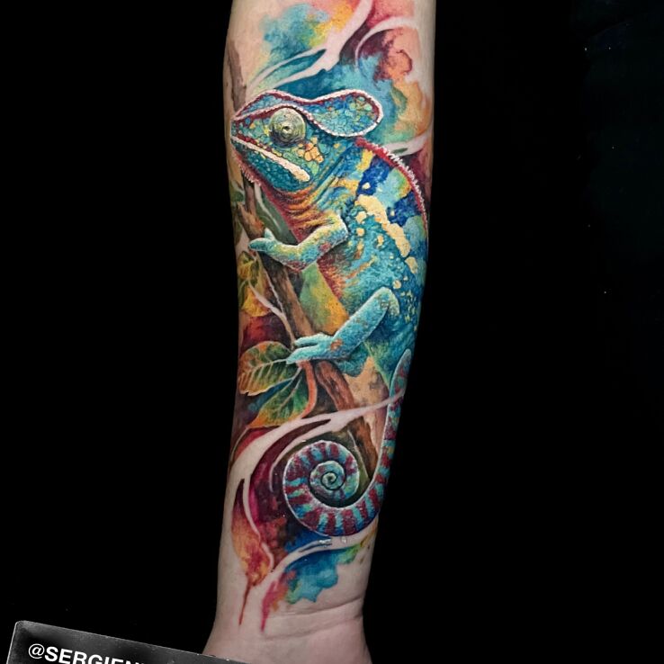 Tattoo Kameleon in colorful motif and realistic style On the arm